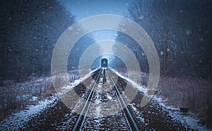 Train tracks in winter mist