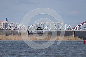 The train is traveling along the railway bridge photo