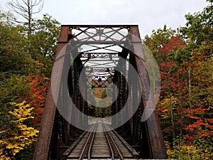 Train trestle in New Hampshire on autumn day