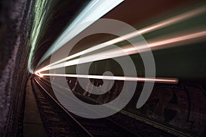 Train in a tunnel at night