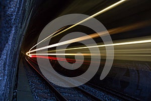 Train in a tunnel at night