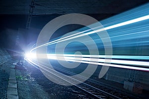 Train in a tunnel at night