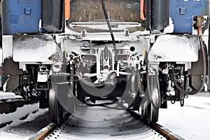 Train wagon buffers and links frozen in winter photo