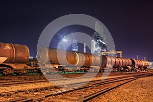 Train wagons at an refinery at night, Port of Antwerp, Belgium