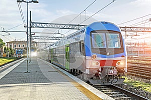 Train in waiting for passangers at the railway station photo