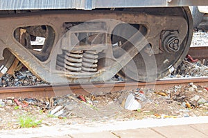 Train wheel close up on railway track at station