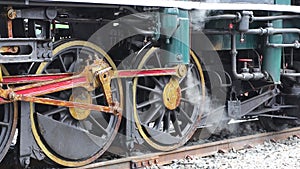 The train wheel of Steam locomotive prepares to depart Start the steam