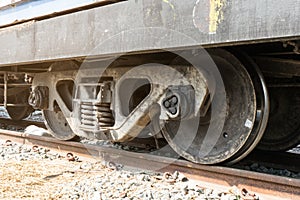 Train wheels on tracks with train bogie