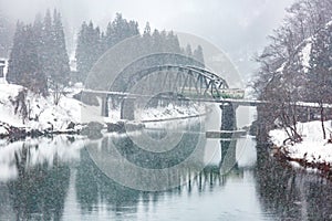 Train in Winter landscape snow