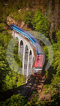 Train on Zampach viaduct, Czech Republic photo