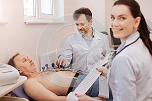 Trained medical professionals monitoring the procedure
