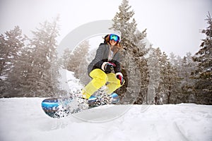 Trained woman snowboarding