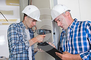 Trainee electrician learning their trade