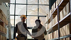 Trainee scans boxes in warehouse