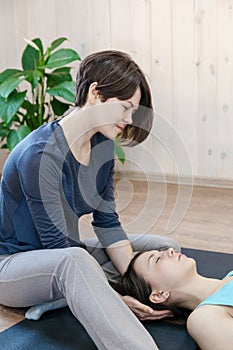 Trainer doing special therapy with physical contact