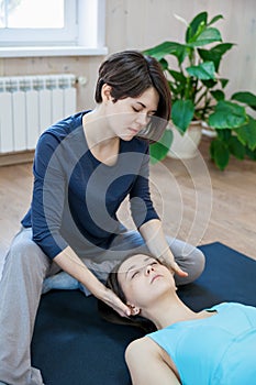 Trainer doing special therapy with physical contact