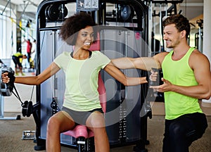 Trainer explaining how to use training machine