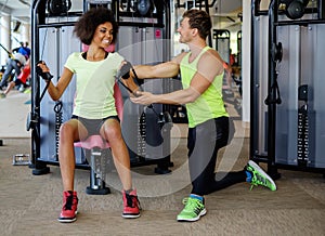 Trainer explaining how to use training machine