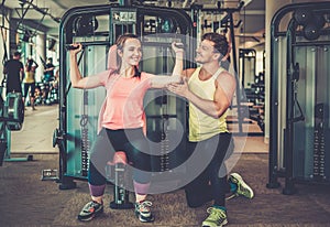 Trainer explaining how to use training machine