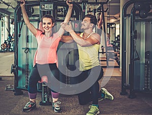 Trainer explaining how to use training machine