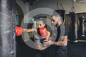 Trainer and female boxer