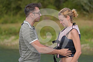 trainer giving instructions to water skier