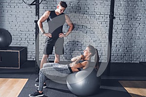 woman exercising on fitness ball