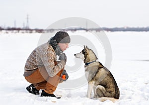 Trainer and Siberian huskies