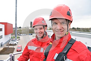 training in altitude rescue at the fire brigade - emergency operation with a crane trolley and abseiling