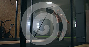 Training of the boxer striking technique. Push the bar with one hand. build-up of force blows for the fighter. Training