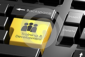 Training and development word on black keyboard