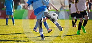 Training and football match between youth soccer teams