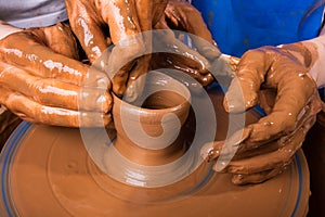 Training to potter's skill on a pottery wheel
