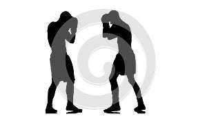 Training between two sportsmen boxers men. Silhouette. Slow motion
