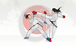 Training of two women with black belts in karate