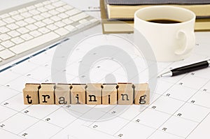 Training wording and timetable on office table photo