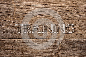 Training written on wooden background