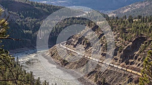 Trains Laboring through the Fraser Canyon in Britsh Columbia