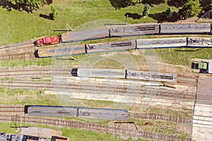 Trains at railroad yard at station district, aerial view