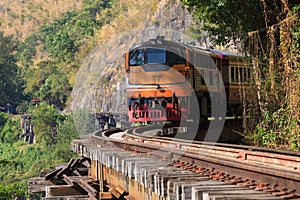 trains running on death railways track crossing kwai river in kanchanaburi thailand this railways important destination of world