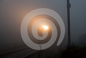 Trainspotting in the morning fog photo