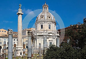 Trajan`s Column and The Church of the Most Holy Name of Mary at the Trajan Forum, Rome, Italy