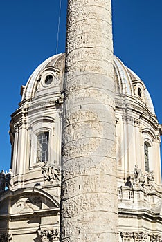 Trajan`s Column and Church of Santa Maria di Loreto in Rome, Ita