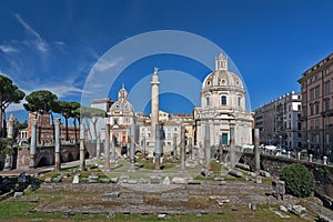 Trajan`s forum in Rome, ancient ruins, buildings: Trajan`s column, Santissimo Nome di Maria al Foro Traiano Church, Basilica Ulp