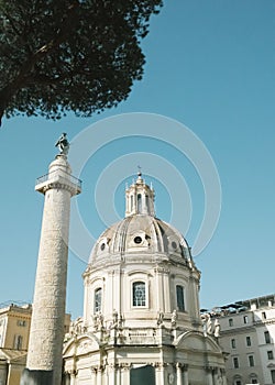 Trajan's Column and Church Dome in Rome photo