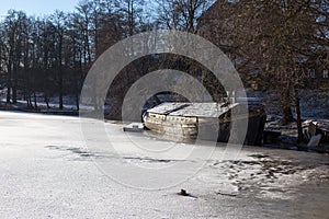 Trakai, Lithuania - 01 08 22: old boat on a frozen lake