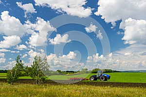 Traktor on Green Field