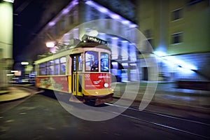 Tram 28 passing through Lisbon streets