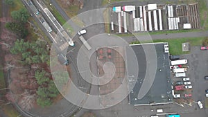 Tram Arrives and Departs Away at Suburban Bergsjon, Gothenburg, Aerial