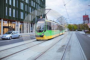 Tram blurred by motion, abstract photo, public transportation in Poznan, Poland.